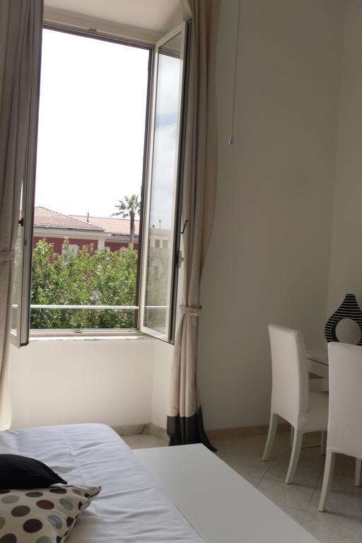 5 Rooms Affittacamere Чивітавекк'я Номер фото